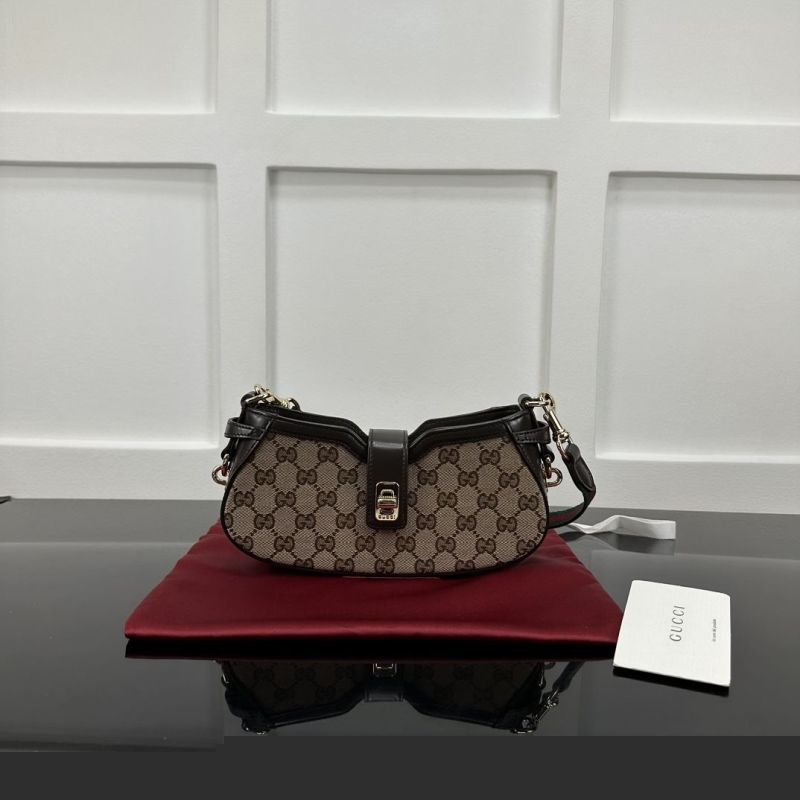 G*u*i satchel bags